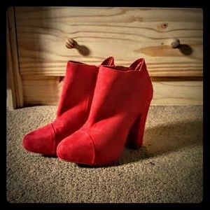 Wonderful red booties with a 3in heel.